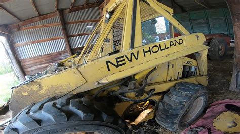 how to remove hydraulic cylinder for skid steer|new holland skid steer removal.